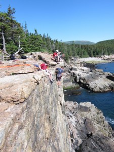 Sukes belaying next to a guided group of climbers. Sukes belaying next to a guided group of climbers.